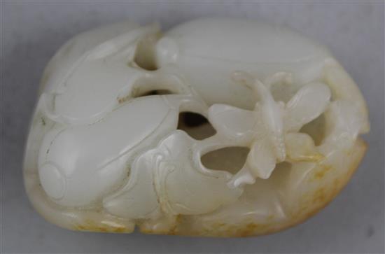 A Chinese white and russet skin jade melon carving, 19th century, 5.1cm